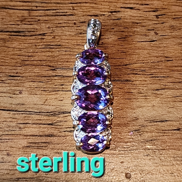 sterling Jewelry - Sterling silver gold vermeil purple stone pendant the stones